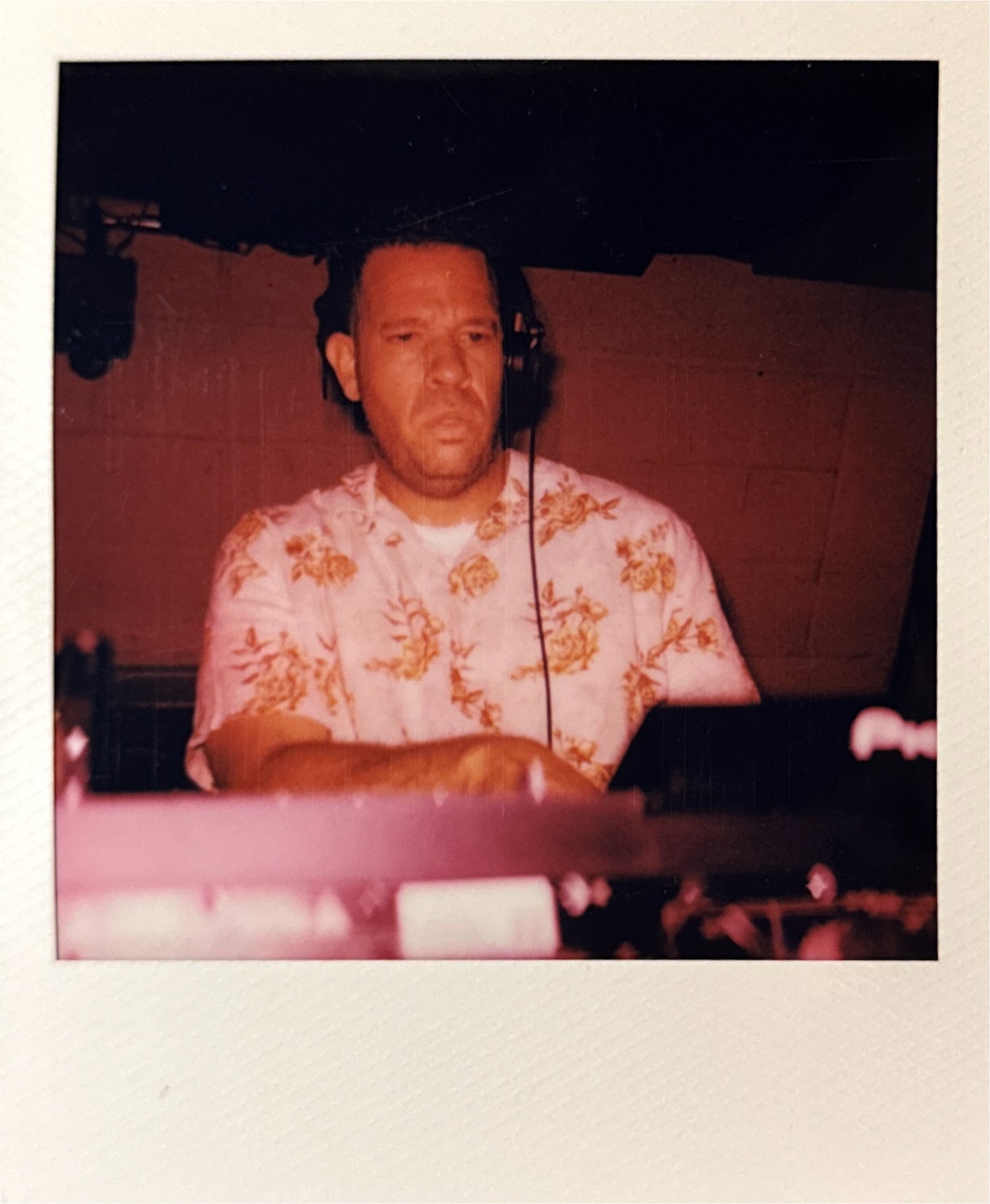 MonkeyMan DJing in Hawaiian shirt